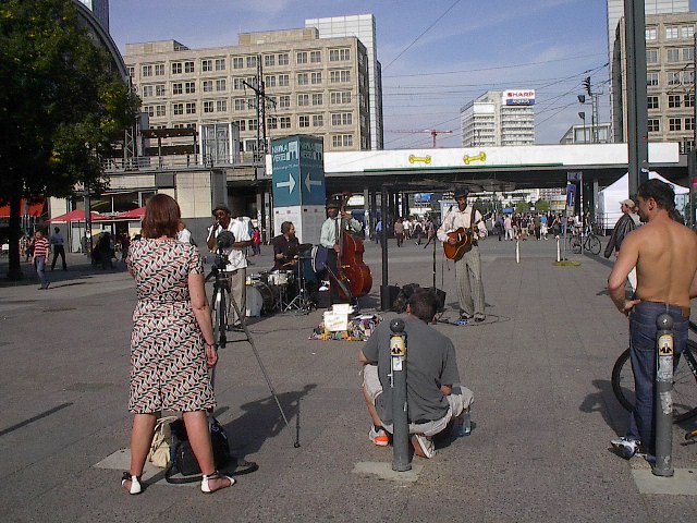 Band Playing at Alexanderplatz Berlin by Red Haircrow